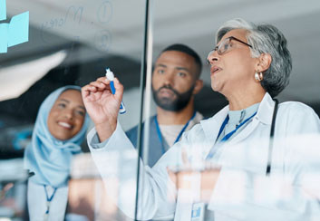 Team of medical professionals working at Acceleration Platform pillar 1